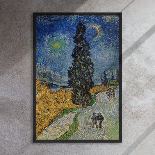 Van Gogh's 'Road with Cypress and Star' on a 24"x36" black framed canvas print on a textured gray wall.