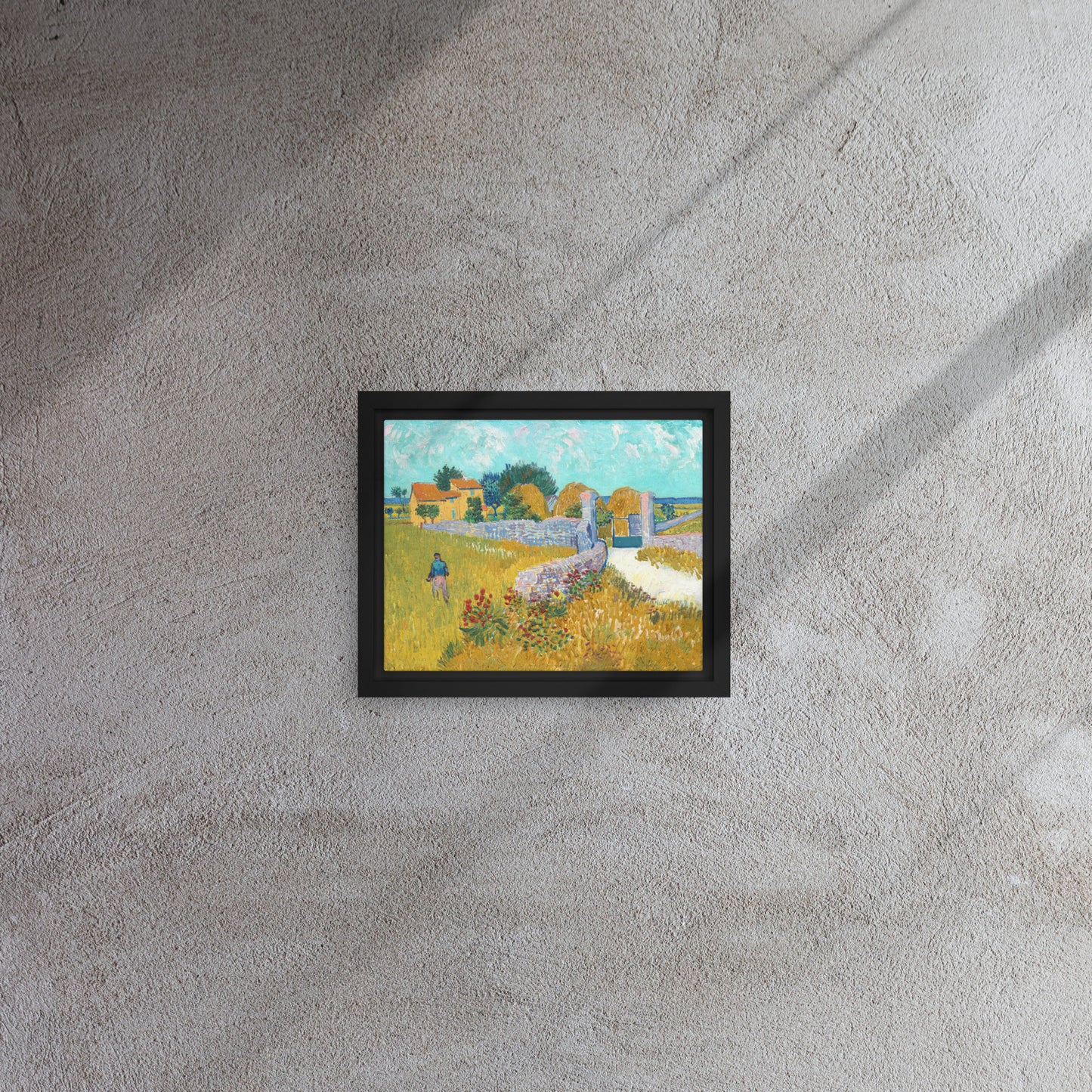 Van Gogh's 'Farmhouse in Provence' on a 8"x10" black framed canvas print on a textured gray wall.