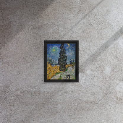 Van Gogh's 'Road with Cypress and Star' on a 8"x10" black framed canvas print on a textured gray wall.