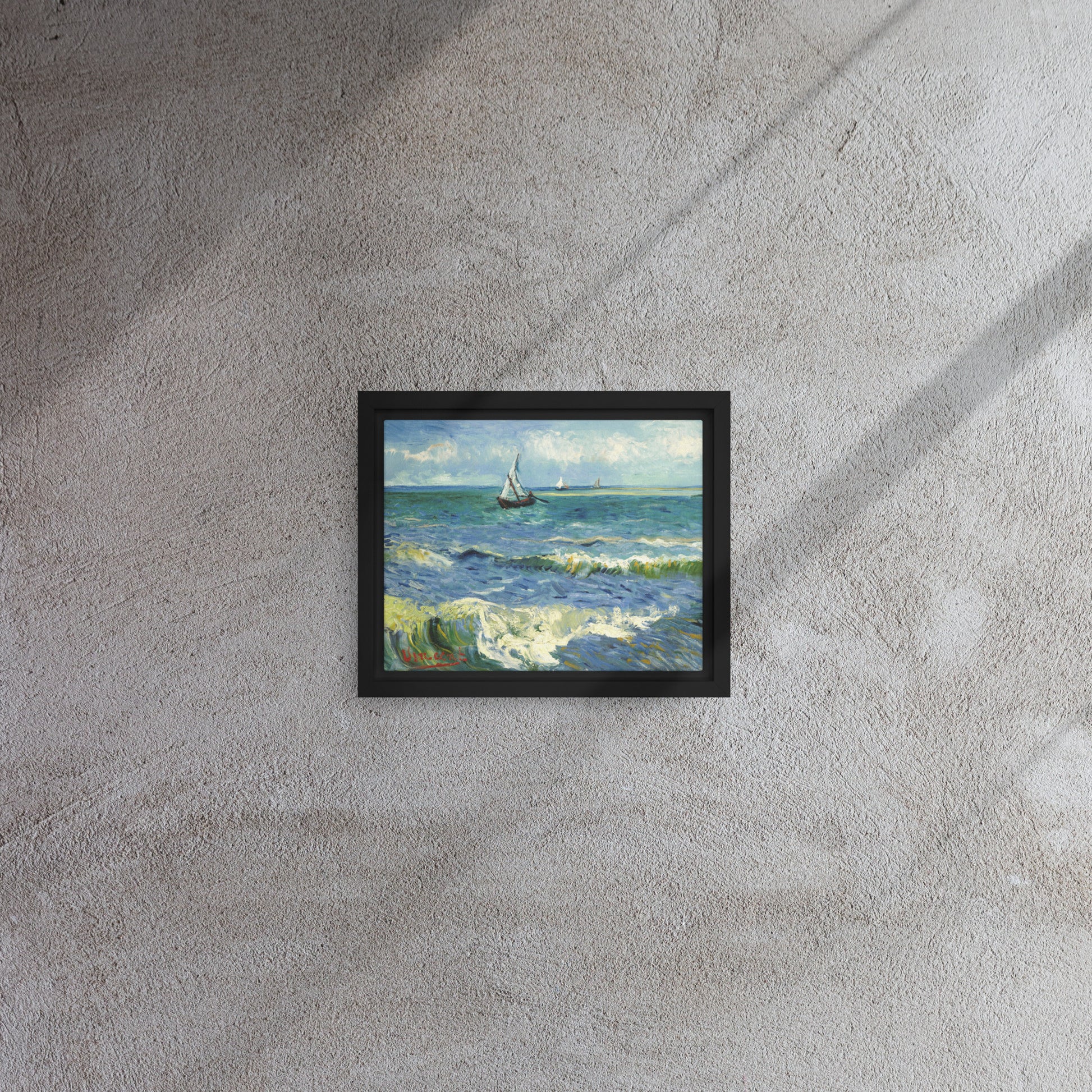 Van Gogh's 'The Sea at Les Saintes-Maries-de-la-Mer' on a 8"x10" black framed canvas print on a textured gray wall.