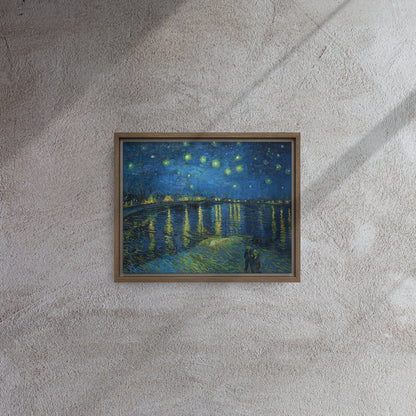 Van Gogh's 'Starry Night Over the Rhone' on a 11"x14" brown framed canvas print on a textured gray wall.
