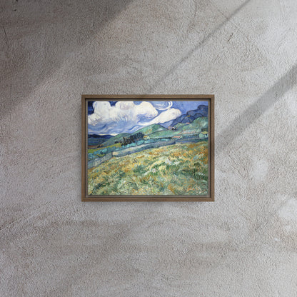 Van Gogh's 'Landscape from Saint-Rémy' on a 11"x14" brown framed canvas print on a textured gray wall.