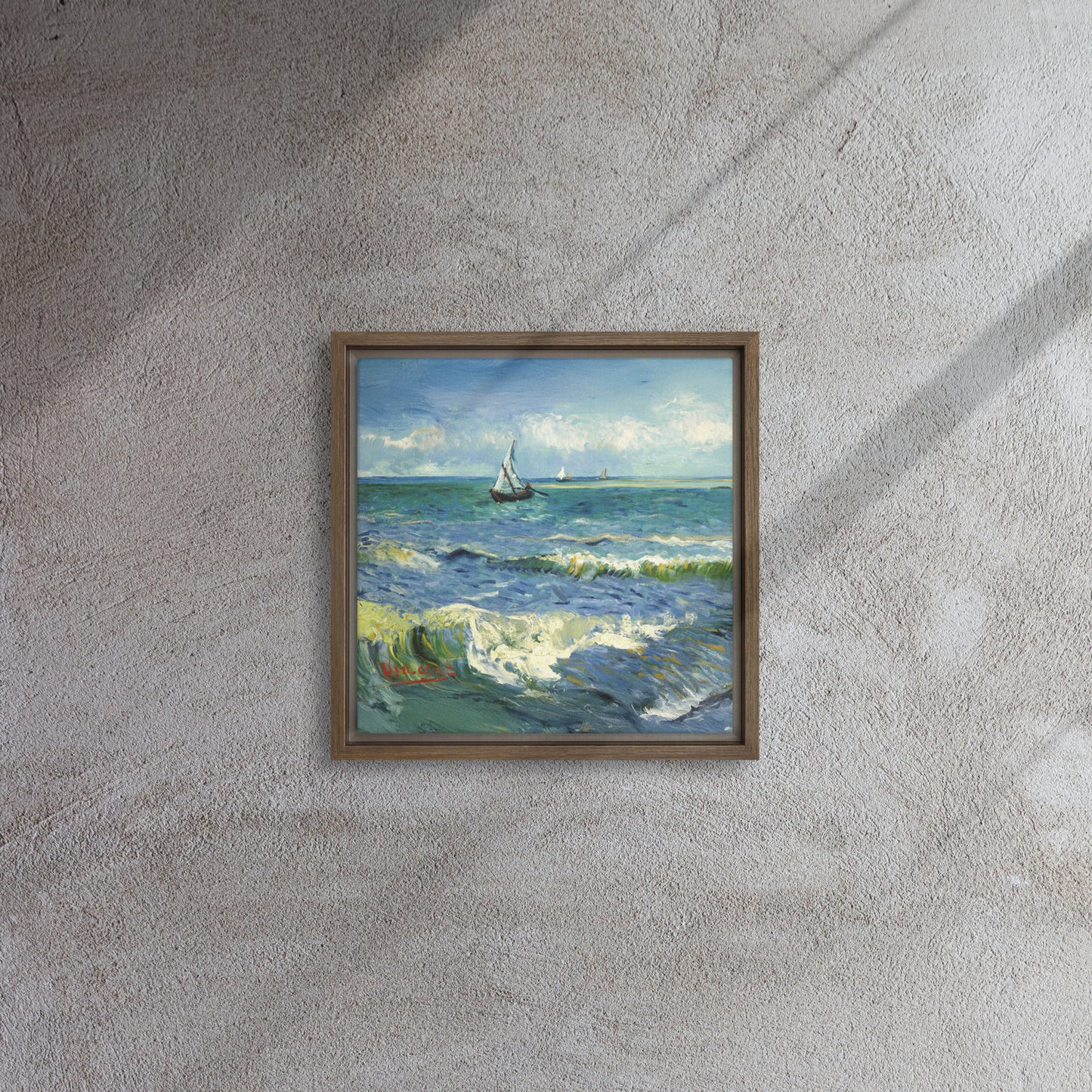 Van Gogh's 'The Sea at Les Saintes-Maries-de-la-Mer' on a 12"x12" brown framed canvas print on a textured gray wall.
