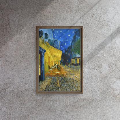 Van Gogh's 'Café Terrace at Night' on a 12"x18" brown framed canvas print on a textured gray wall.