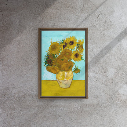Van Gogh's 'Vase with Twelve Sunflowers' on a 12"x18" brown framed canvas print on a textured gray wall.