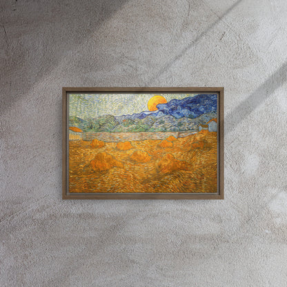 Van Gogh's 'Landscape with Wheat Sheaves and Rising Moon' on a 12"x18" brown framed canvas print on a textured gray wall.