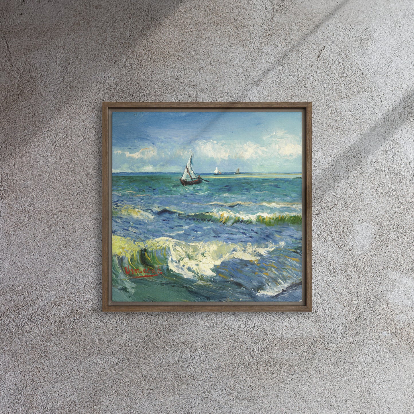 Van Gogh's 'The Sea at Les Saintes-Maries-de-la-Mer' on a 16"x16" brown framed canvas print on a textured gray wall.