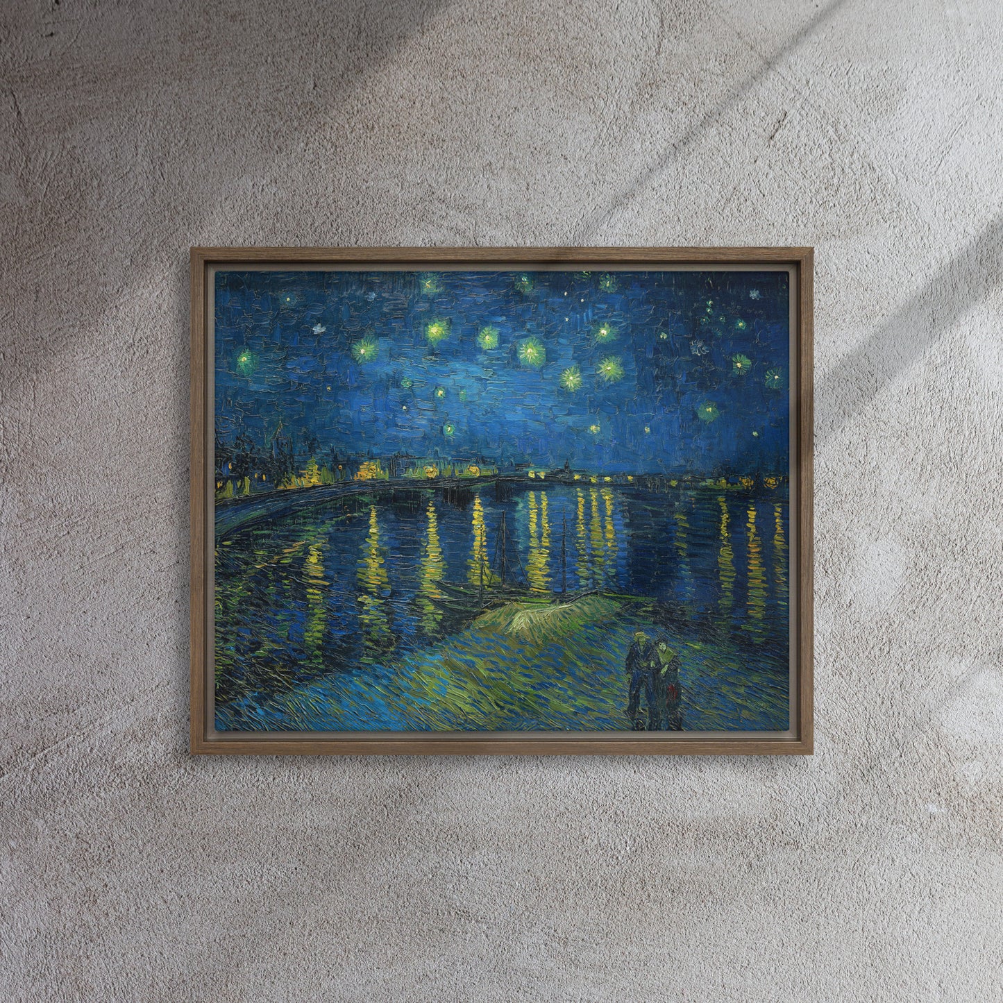 Van Gogh's 'Starry Night Over the Rhone' on a 16"x20" brown framed canvas print on a textured gray wall.