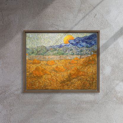 Van Gogh's 'Landscape with Wheat Sheaves and Rising Moon' on a 16"x20" brown framed canvas print on a textured gray wall.