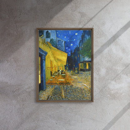 Van Gogh's 'Café Terrace at Night' on a 18"x24" brown framed canvas print on a textured gray wall.