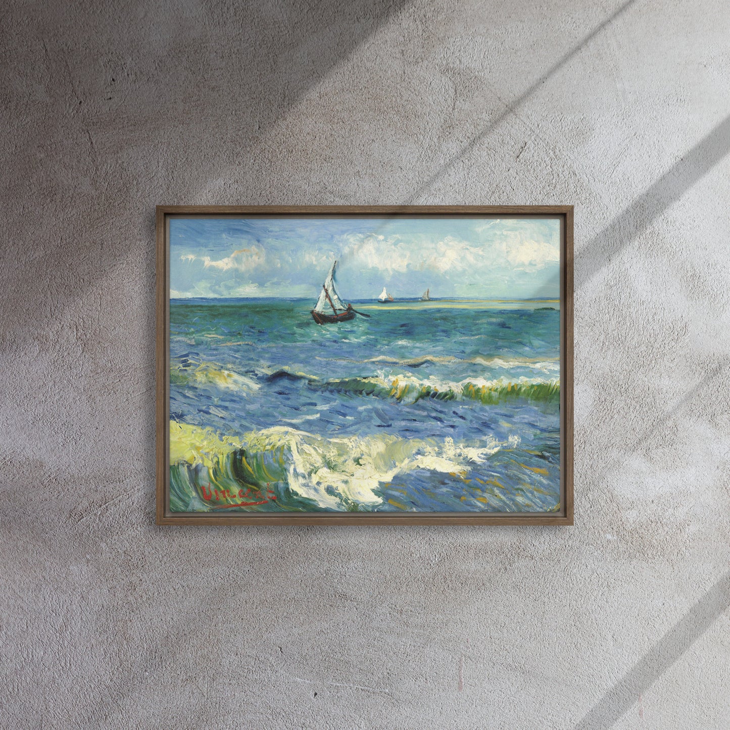 Van Gogh's 'The Sea at Les Saintes-Maries-de-la-Mer' on a 18"x24" brown framed canvas print on a textured gray wall.