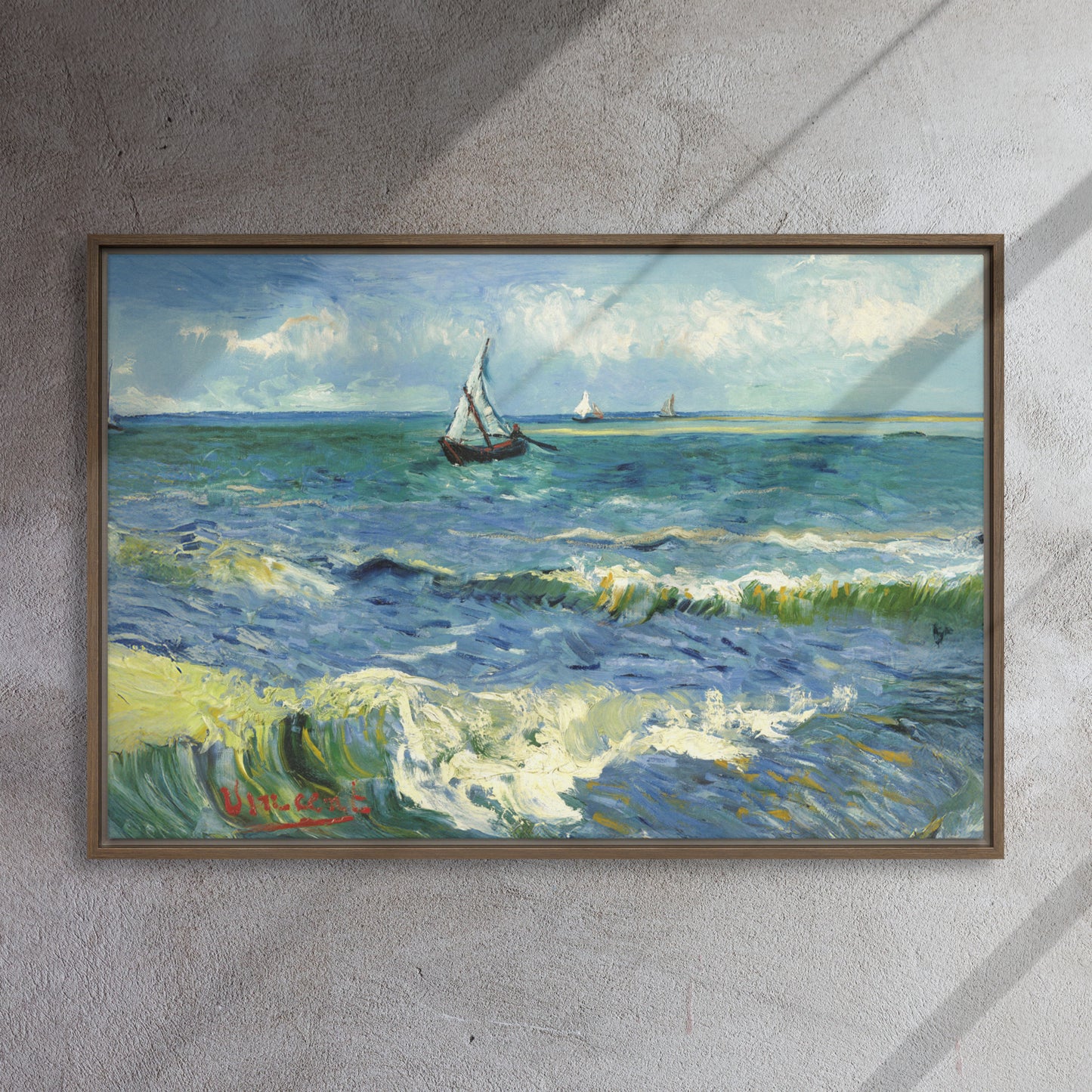 Van Gogh's 'The Sea at Les Saintes-Maries-de-la-Mer' on a 24"x36" brown framed canvas print on a textured gray wall.
