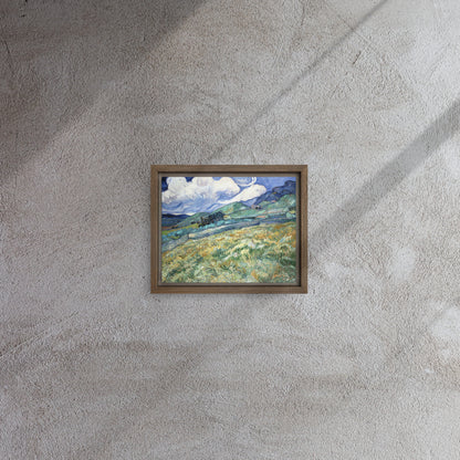 Van Gogh's 'Landscape from Saint-Rémy' on a 8"x10" brown framed canvas print on a textured gray wall.