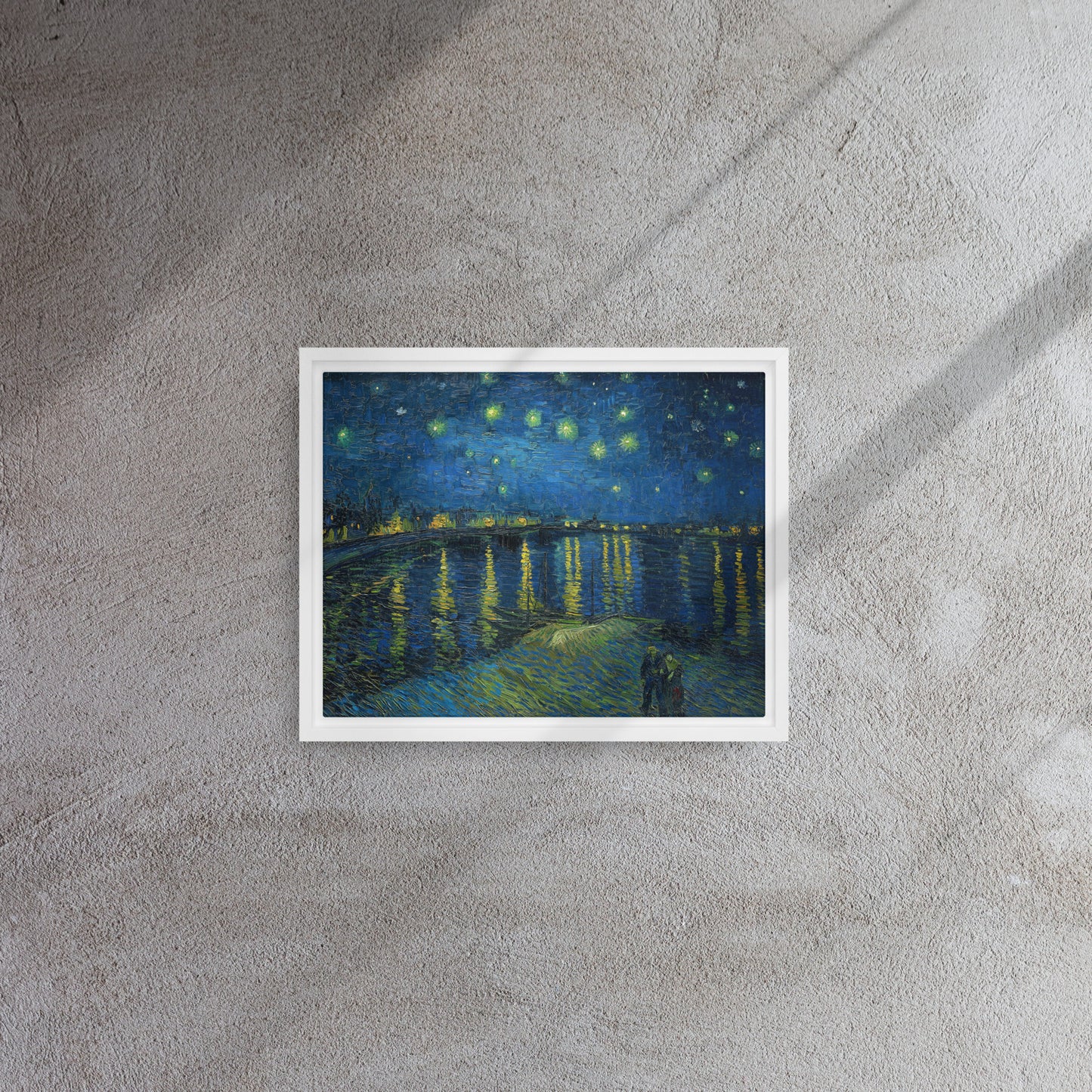 Van Gogh's 'Starry Night Over the Rhone' on a 11"x14" white framed canvas print on a textured gray wall.