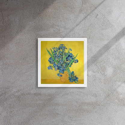Van Gogh's 'Vase with Irises Against a Yellow Background' on a 12"x12" white framed canvas print on a textured gray wall.