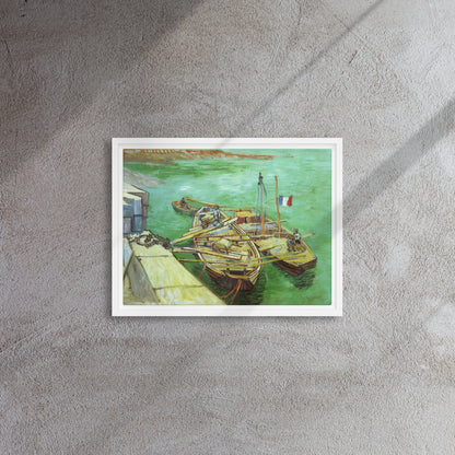 Van Gogh's 'Quay with Men Unloading Sand Barges' on a 12"x16" white framed canvas print on a textured gray wall.