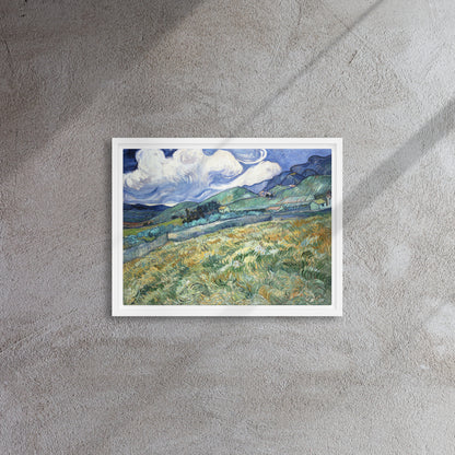 Van Gogh's 'Landscape from Saint-Rémy' on a 12"x16" white framed canvas print on a textured gray wall.