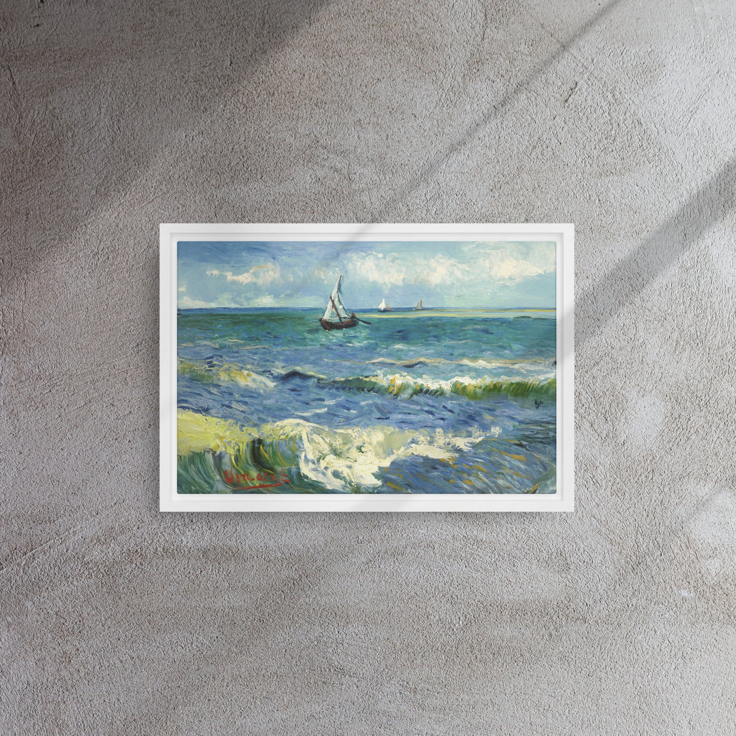 Van Gogh's 'The Sea at Les Saintes-Maries-de-la-Mer' on a 12"x18" white framed canvas print on a textured gray wall.