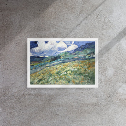 Van Gogh's 'Landscape from Saint-Rémy' on a 12"x18" white framed canvas print on a textured gray wall.