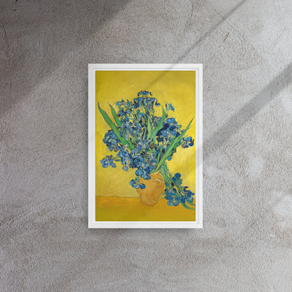 Van Gogh's 'Vase with Irises Against a Yellow Background' on a 12"x18" white framed canvas print on a textured gray wall.