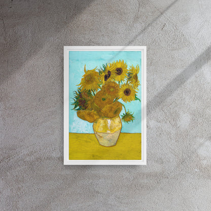 Van Gogh's 'Vase with Twelve Sunflowers' on a 12"x18" white framed canvas print on a textured wall.