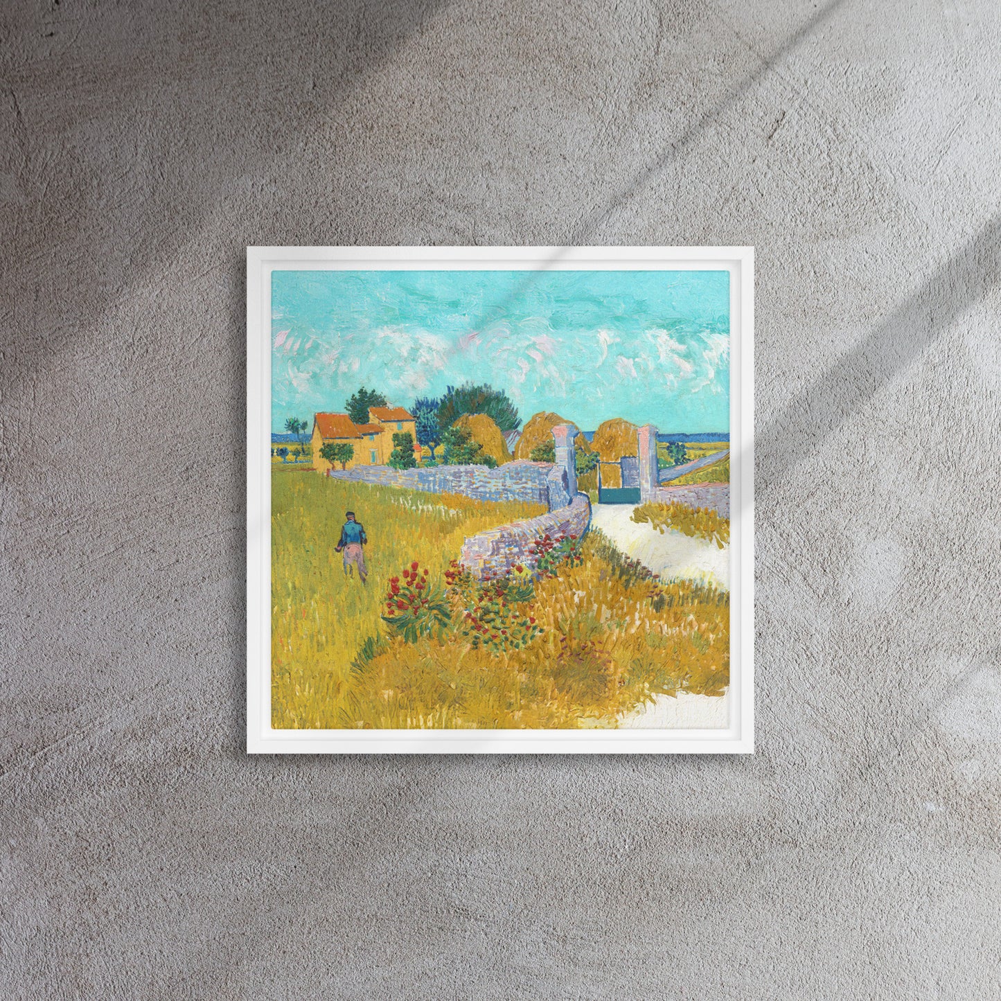 Van Gogh's 'Farmhouse in Provence' on a 16"x16" white framed canvas print on a textured gray wall.