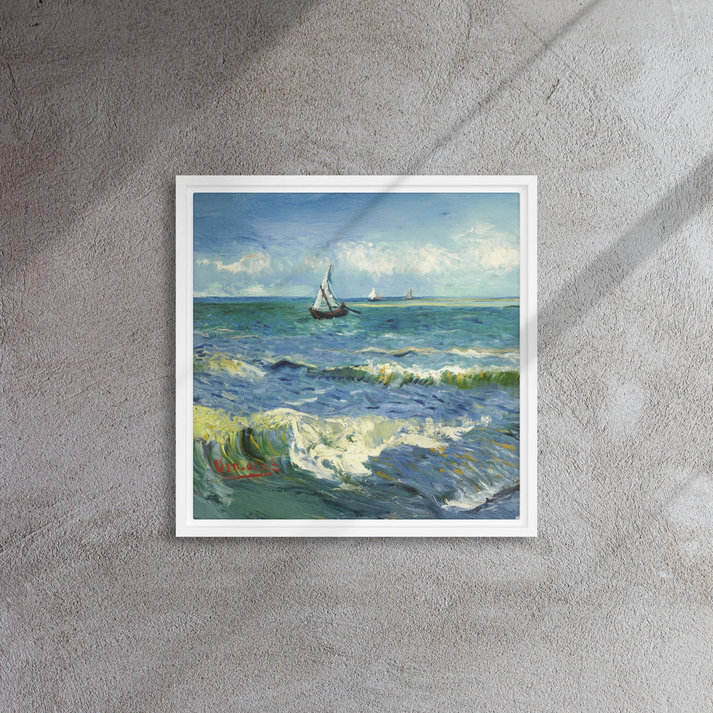 Van Gogh's 'The Sea at Les Saintes-Maries-de-la-Mer' on a 16"x16" white framed canvas print on a textured gray wall.