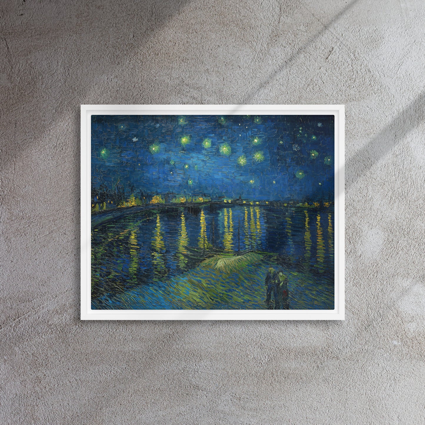 Van Gogh's 'Starry Night Over the Rhone' on a 16"x20" white framed canvas print on a textured gray wall.