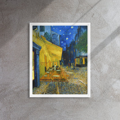 Van Gogh's 'Café Terrace at Night' on a 16"x20" white framed canvas print on a textured gray wall.