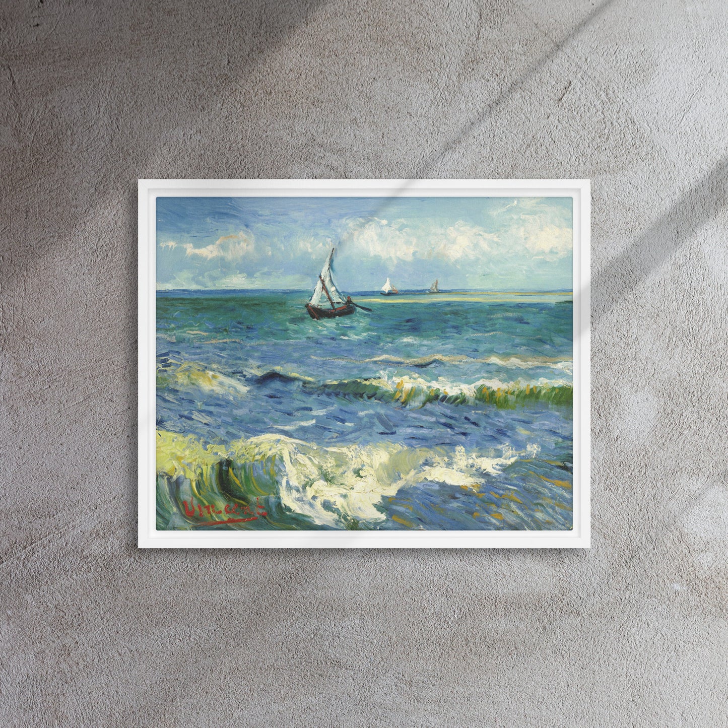 Van Gogh's 'The Sea at Les Saintes-Maries-de-la-Mer' on a 16"x20" white framed canvas print on a textured gray wall.