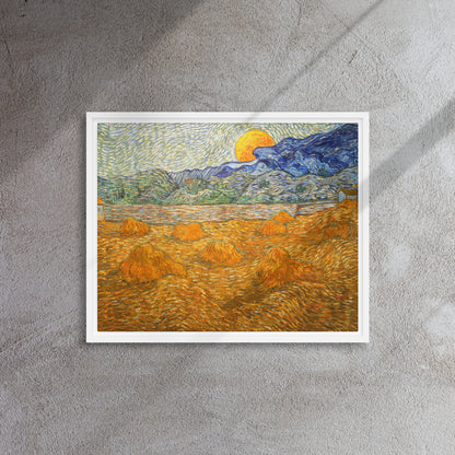 Van Gogh's 'Landscape with Wheat Sheaves and Rising Moon' on a 16"x20" white framed canvas print on a textured gray wall.