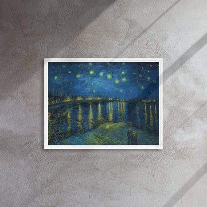 Van Gogh's 'Starry Night Over the Rhone' on a 18"x24" white framed canvas print on a textured gray wall.
