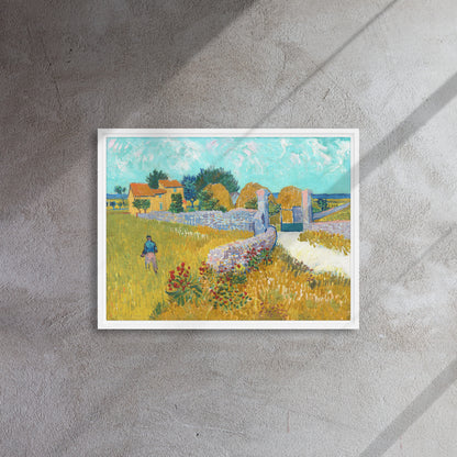 Van Gogh's 'Farmhouse in Provence' on a 18"x24" white framed canvas print on a textured gray wall.