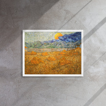 Van Gogh's 'Landscape with Wheat Sheaves and Rising Moon' on a 18"x24" white framed canvas print on a textured gray wall.