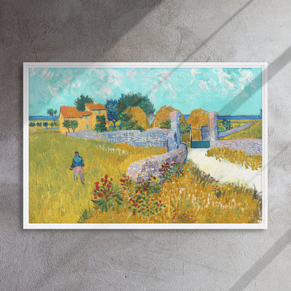 Van Gogh's 'Farmhouse in Provence' on a 24"x36" white framed canvas print on a textured gray wall.
