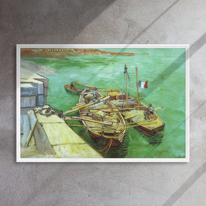 Van Gogh's 'Quay with Men Unloading Sand Barges' on a 24"x36" white framed canvas print on a textured gray wall.