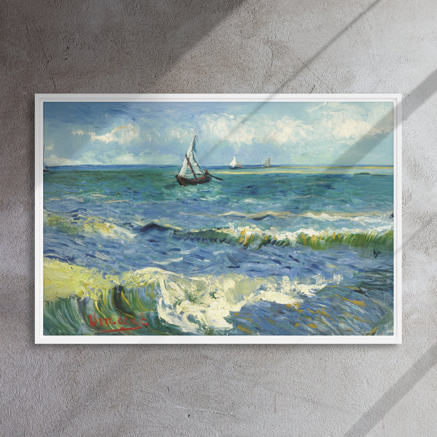 Van Gogh's 'The Sea at Les Saintes-Maries-de-la-Mer' on a 24"x36" white framed canvas print on a textured gray wall.