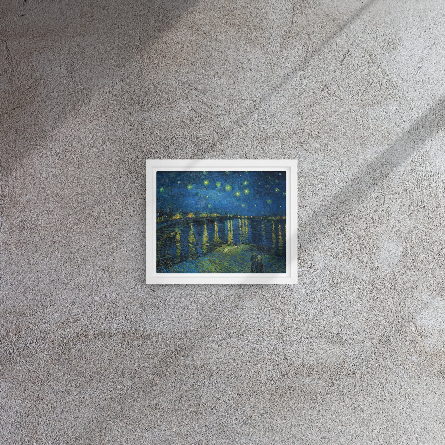 Van Gogh's 'Starry Night Over the Rhone' on a 8"x10" white framed canvas print on a textured gray wall.