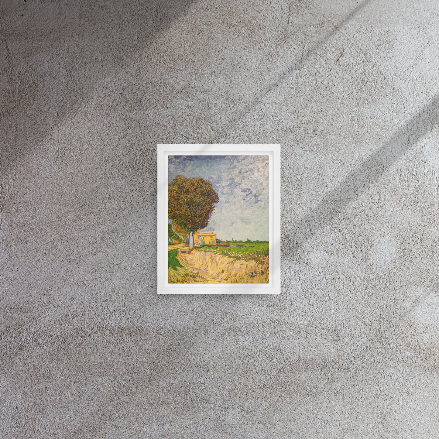 Van Gogh's 'A Lane near Arles' on a 8"x10" white framed canvas print on a textured gray wall.