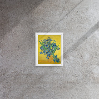 Van Gogh's 'Vase with Irises Against a Yellow Background' on a 8"x10" white framed canvas print on a textured gray wall.